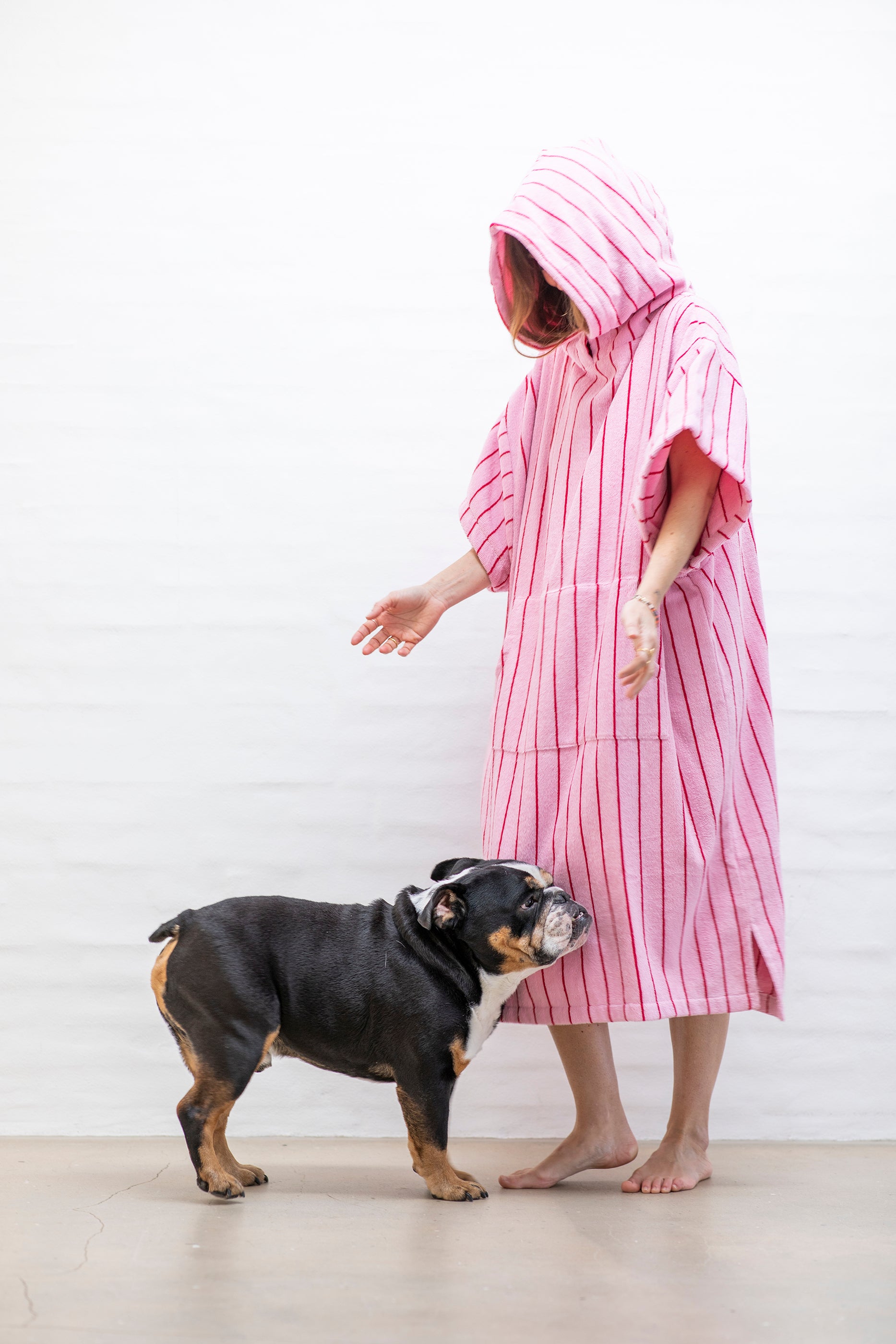 Naram Poncho, baby pink & ski patrol red